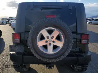 2009 Jeep Wrangler Rubicon with VIN 1J4GA64119L762714, listed as a Copart auction lot 80943364 with Not Provided miles and Salvage Title. Bid and sale history available at DreamBid. Image 6.