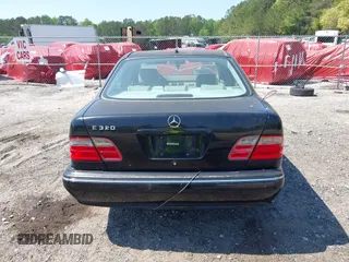 2000 Mercedes-Benz E 320 with VIN WDBJF65J2YB105399, listed as a IAAI auction lot 42076107 with 277,701 mi miles and . Bid and sale history available at DreamBid. Image 16.