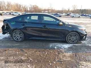 2023 Kia Forte GT-Line z VIN 3KPF54AD2PE534865, wystawiony jako IAAI lot #41417713 z przebiegiem 24 074 mil mil oraz . Historia ofert i sprzedaży dostępna na DreamBid. Obrazek 13.