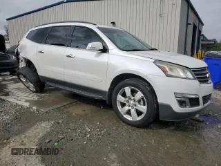 2016 Chevrolet Traverse LT with VIN 1GNKRGKD0GJ118570, listed as a Copart auction lot 50697755 with 121,181 mi miles and Salvage title. Bid and sale history available at DreamBid. Image 4.