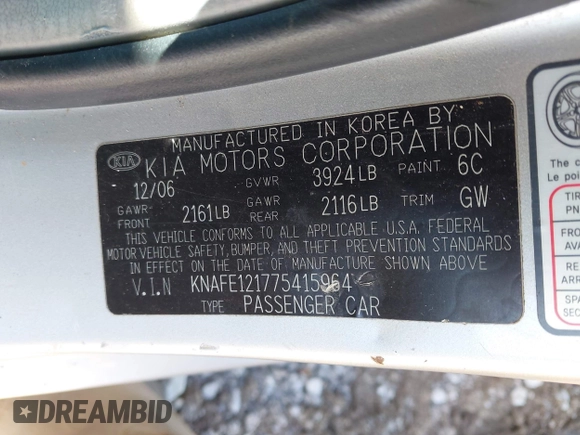 2007 Kia Spectra EX with VIN KNAFE121775415964, listed as a IAAI auction lot 41951831 with 176,903 mi miles. Bid and sale history available at carsss.com. Image 9.