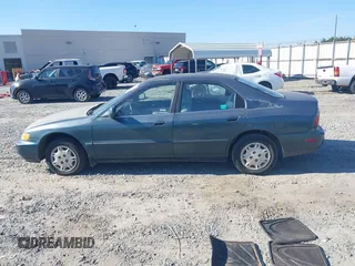 1997 Honda Accord Value with VIN 1HGCD5680VA148728, listed as a IAAI auction lot 41011149 with 198,773 mi miles and . Bid and sale history available at carsss.com. Image 14.