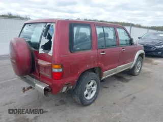 1999 Isuzu Trooper S with VIN JACDJ58X8X7920942, listed as a IAAI auction lot 42029335 with 164,186 mi miles and . Bid and sale history available at DreamBid. Image 4.