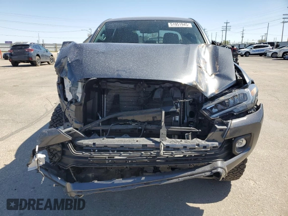 2023 Toyota Tacoma SR5 z VIN 3TMDZ5BN7PM140616, wystawiony jako Copart lot #51951945 z przebiegiem 30 274 mil mil oraz Szkoda całkowita • Salvage title. Historia ofert i sprzedaży dostępna na DreamBid. Obrazek 5.