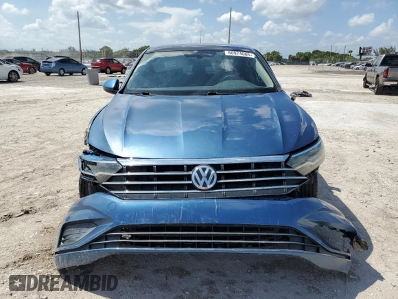 2020 Volkswagen Jetta S z VIN 3VWCB7BU4LM030441, wystawiony jako Copart lot #60974605 z przebiegiem 73 223 mil mil oraz Czysty tytuł • Clean title. Historia ofert i sprzedaży dostępna na DreamBid. Obrazek 5.