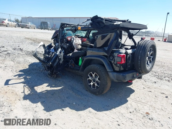 2020 Jeep Wrangler Unlimited Rubicon with VIN 1C4HJXFG2LW147242, listed as a IAAI auction lot 41630952 with Not provided miles and . Bid and sale history available at DreamBid. Image 3.