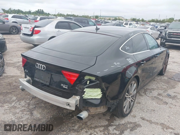 2012 Audi A7 Premium Plus with VIN WAUSGAFC8CN002238, listed as a IAAI auction lot 40278325 with 97,544 mi miles and . Bid and sale history available at DreamBid. Image 4.