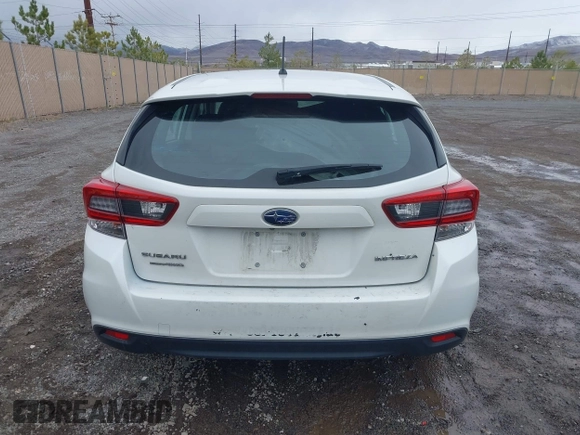 2021 Subaru Impreza with VIN 4S3GTAB6XM3705793, listed as a IAAI auction lot 41895201 with 77,254 mi miles and . Bid and sale history available at DreamBid. Image 17.