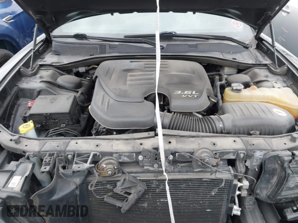 2015 Dodge Charger SE with VIN 2C3CDXBG7FH841469, listed as a IAAI auction lot 42001599 with 103,342 mi miles and . Bid and sale history available at DreamBid. Image 10.