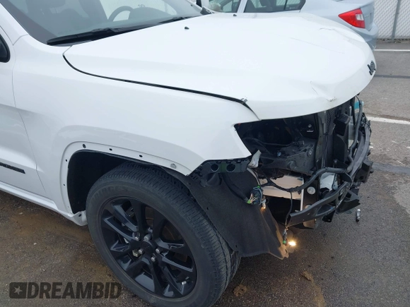 2021 Jeep Grand Cherokee Laredo E with VIN 1C4RJEAG7MC713026, listed as a IAAI auction lot 42010894 with 37,336 mi miles and . Bid and sale history available at DreamBid. Image 19.