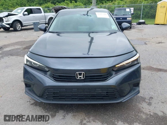 2023 Honda Civic EX with VIN 2HGFE1F73PH312228, listed as a IAAI auction lot 42185408 with 19,339 mi miles and . Bid and sale history available at DreamBid. Image 12.