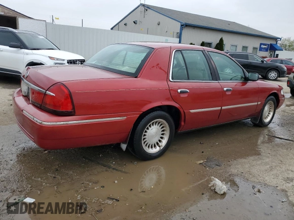 2000 Mercury Grand Marquis LS z VIN 2MEFM75WXYX726819, wystawiony jako Copart lot #52873675 z przebiegiem 144 692 mil mil oraz Nie do naprawy. Historia ofert i sprzedaży dostępna na DreamBid. Obrazek 3.