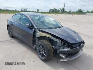 2023 Tesla Model 3 with VIN 5YJ3E1EA7PF417293, listed as a IAAI auction lot 42407659 with 22,578 mi miles and . Bid and sale history available at DreamBid. Image 1.