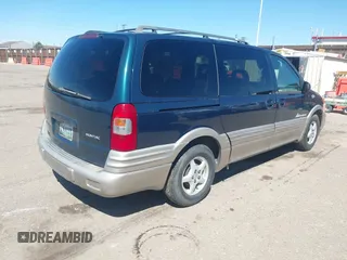 1999 Pontiac Montana with VIN 1GMDX03E0XD166084, listed as a IAAI auction lot 41872976 with 196,027 mi miles and . Bid and sale history available at DreamBid. Image 4.