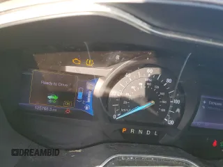 2013 Ford Fusion SE Hybrid с VIN 3FA6P0LU6DR157953, выставлен на аукционе Copart как лот 61175825 с пробегом 125 768 миль миль и Чистый • Clean title. История ставок и продаж доступна на DreamBid. Изображение 9.