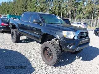 2015 Toyota Tacoma with VIN 3TMLU4EN1FM167938, listed as a IAAI auction lot 42349196 with 150,865 mi miles and . Bid and sale history available at DreamBid. Image 1.