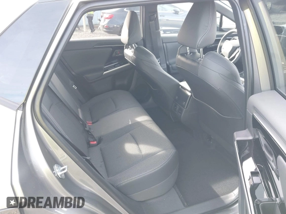 2024 Toyota bZ4X XLE z VIN JTMABACA2RA069207, wystawiony jako IAAI lot #41632667 z przebiegiem 7329 mil mil oraz . Historia ofert i sprzedaży dostępna na DreamBid. Obrazek 8.