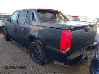 2008 Cadillac Escalade EXT z VIN 3GYFK62808G147107, wystawiony jako IAAI lot #41397796 z przebiegiem Nie podano mil oraz . Historia ofert i sprzedaży dostępna na DreamBid. Obrazek 3.