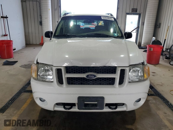 2004 Ford Explorer Sport Trac XLS with VIN 1FMZU77K74UB23543, listed as a Copart auction lot 62859625 with 96,873 mi miles and Salvage title. Bid and sale history available at DreamBid. Image 5.