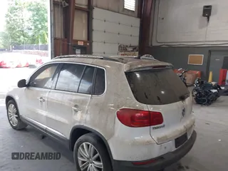 2012 Volkswagen Tiguan SE with VIN WVGAV7AXXCW533237, listed as a IAAI auction lot 42670923 with 227,323 mi miles and . Bid and sale history available at DreamBid. Image 14.