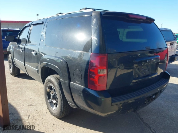2007 Chevrolet Suburban LT with VIN 3GNFC16077G301103, listed as a IAAI auction lot 41673885 with 196,962 mi miles. Bid and sale history available at carsss.com. Image 3.