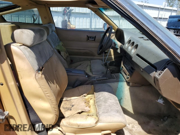 1982 Datsun 280ZX z VIN JN1HZ04S0CX433451, wystawiony jako Copart lot #53912864 z przebiegiem 200 629 mil mil oraz Tytuł czysty. Historia ofert i sprzedaży dostępna na DreamBid. Obrazek 10.