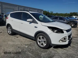 2013 Ford Escape SE with VIN 1FMCU0GX3DUA19981, listed as a Copart auction lot 60905255 with 212,730 mi miles and Salvage title. Bid and sale history available at DreamBid. Image 4.