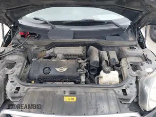 2015 MINI Countryman with VIN WMWZB3C53FWR43819, listed as a IAAI auction lot 41610007 with 134,185 mi miles and . Bid and sale history available at DreamBid. Image 10.