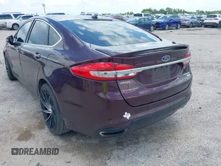 2018 Ford Fusion Titanium with VIN 3FA6P0K92JR114283, listed as a IAAI auction lot 42704476 with 92,502 mi miles and . Bid and sale history available at DreamBid. Image 3.