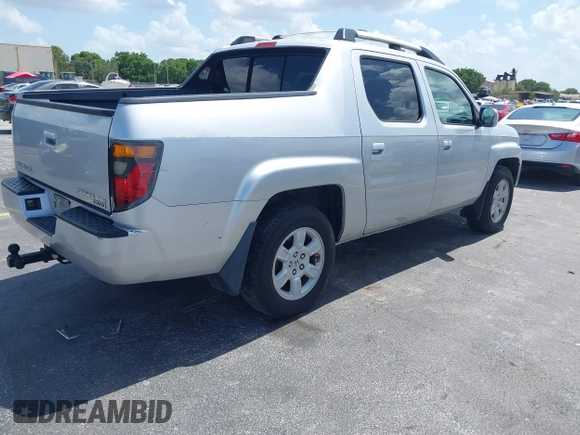 2007 Honda Ridgeline RTL z VIN 2HJYK16557H506463, wystawiony jako IAAI lot #42511456 z przebiegiem 133 701 mil mil oraz . Historia ofert i sprzedaży dostępna na DreamBid. Obrazek 4.