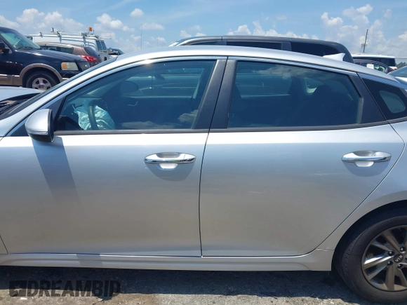 2019 Kia Optima LX with VIN 5XXGT4L3XKG345802, listed as a IAAI auction lot 42609317 with 74,664 mi miles and . Bid and sale history available at DreamBid. Image 14.