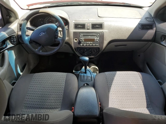 2007 Ford Focus S z VIN 1FAFP34NX7W360015, wystawiony jako Copart lot #57499655 z przebiegiem 237 516 mil mil oraz Szkoda całkowita • Salvage title. Historia ofert i sprzedaży dostępna na DreamBid. Obrazek 8.