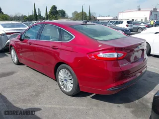 2014 Ford Fusion Energi SE Luxury with VIN 3FA6P0PUXER234528, listed as a IAAI auction lot 41644935 with 151,059 mi miles. Bid and sale history available at carsss.com. Image 3.