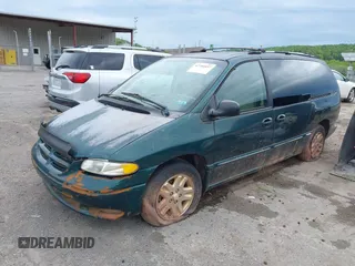 1997 Dodge Grand Caravan with VIN 1B4GT54L6VB439994, listed as a IAAI auction lot 42206857 with 242,219 mi miles and . Bid and sale history available at DreamBid. Image 2.