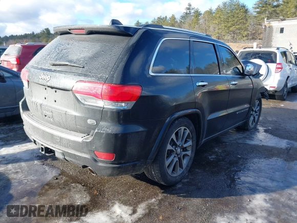 2017 Jeep Grand Cherokee Overland with VIN 1C4RJFCG8HC835645, listed as a IAAI auction lot 41442765 with 95,324 mi miles and . Bid and sale history available at DreamBid. Image 4.