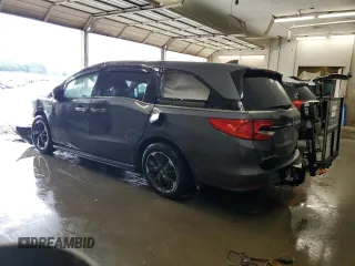 2023 Honda Odyssey Elite with VIN 5FNRL6H98PB056770, listed as a Copart auction lot 56984055 with Not provided miles and Salvage title. Bid and sale history available at DreamBid. Image 2.