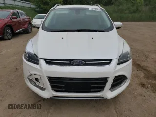 2014 Ford Escape Titanium с VIN 1FMCU0J97EUA87342, выставлен на аукционе Copart как лот 58790145 с пробегом 174 663 миль миль и Чистый • Clean title. История ставок и продаж доступна на DreamBid. Изображение 5.