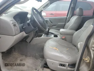 2004 Jeep Grand Cherokee Laredo with VIN 1J4GW48N94C408435, listed as a Copart auction lot 83909444 with Not provided miles and Clean title. Bid and sale history available at DreamBid. Image 7.