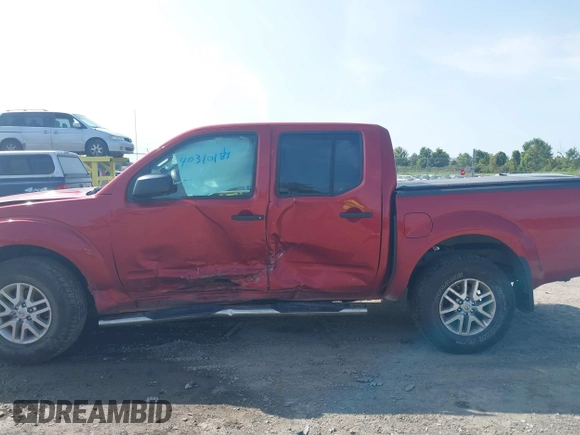 2015 Nissan Frontier Pro-4X with VIN 1N6AD0EV2FN721636, listed as a IAAI auction lot 40310184 with 132,897 mi miles and . Bid and sale history available at DreamBid. Image 14.