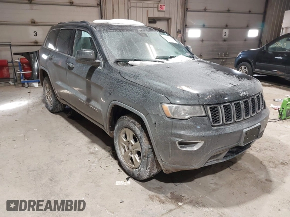 2017 Jeep Grand Cherokee Laredo with VIN 1C4RJFAG6HC661836, listed as a IAAI auction lot 41622814 with 134,509 mi miles. Bid and sale history available at carsss.com. Image 1.