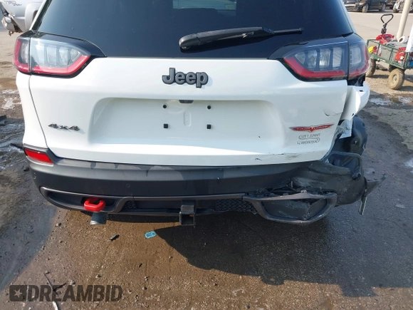 2021 Jeep Cherokee Trailhawk with VIN 1C4PJMBX4MD124980, listed as a IAAI auction lot 42372537 with 55,667 mi miles and . Bid and sale history available at DreamBid. Image 18.