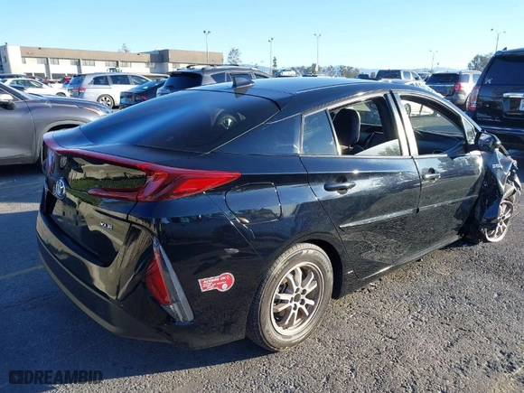2021 Toyota Prius Prime LE with VIN JTDKAMFP3M3189412, listed as a IAAI auction lot 41319157 with 40,522 mi miles. Bid and sale history available at carsss.com. Image 4.