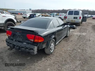 2004 Oldsmobile Alero GX z VIN 1G3NK52F44C107863, wystawiony jako IAAI lot #42018564 z przebiegiem 128 534 mil mil oraz . Historia ofert i sprzedaży dostępna na DreamBid. Obrazek 4.