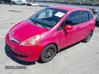 2008 Honda Fit with VIN JHMGD384X8S058806, listed as a IAAI auction lot 42003885 with 216,612 mi miles. Bid and sale history available at carsss.com. Image 2.