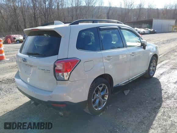2017 Subaru Forester Touring with VIN JF2SJAWC0HH550052, listed as a IAAI auction lot 41475102 with 115,600 mi miles and . Bid and sale history available at DreamBid. Image 4.
