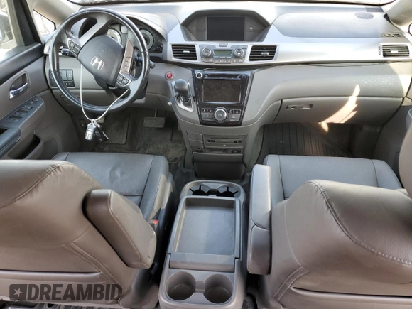 2016 Honda Odyssey with VIN 5FNRL5H62GB143676, listed as a Copart auction lot 54407205 with 113,423 mi miles and Salvage Title. Bid and sale history available at DreamBid. Image 8.
