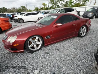 2005 Mercedes-Benz SL 500 z VIN WDBSK75F65F092582, wystawiony jako Copart lot #61799645 z przebiegiem Nie podano mil oraz Czysty tytuł • Clean title. Historia ofert i sprzedaży dostępna na DreamBid. Obrazek 1.