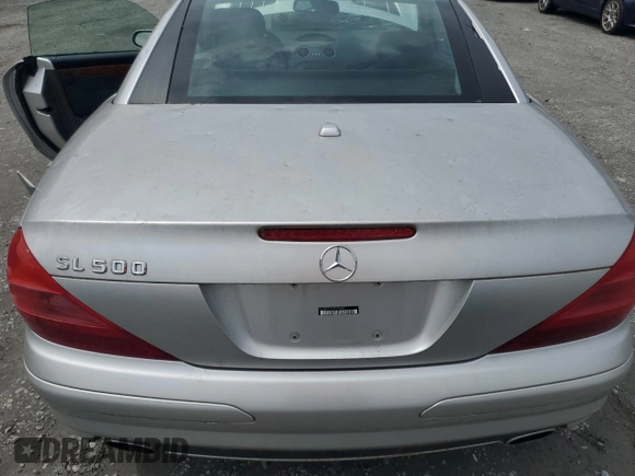 2005 Mercedes-Benz SL 500 with VIN WDBSK75F95F104935, listed as a Copart auction lot 60493705 with 89,994 mi miles and Salvage title. Bid and sale history available at DreamBid. Image 10.