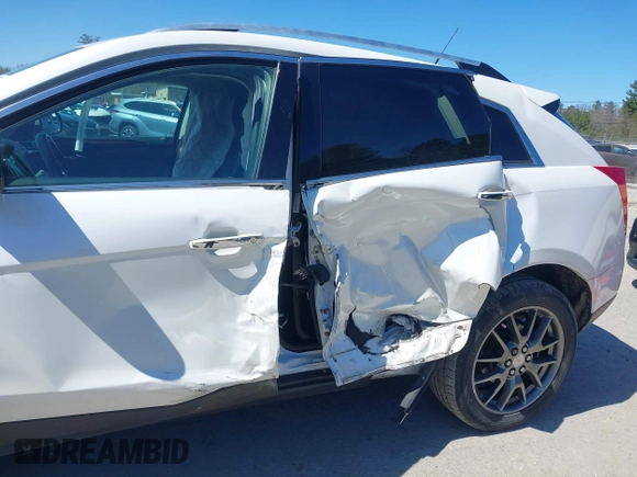 2013 Cadillac SRX Performance Collection with VIN 3GYFNDE33DS637155, listed as a IAAI auction lot 41977706 with 140,668 mi miles and . Bid and sale history available at DreamBid. Image 6.