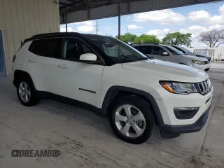 2019 Jeep Compass Altitude with VIN 3C4NJCBB0KT637477, listed as a Copart auction lot 57751005 with 94,316 mi miles and Clean title. Bid and sale history available at DreamBid. Image 4.